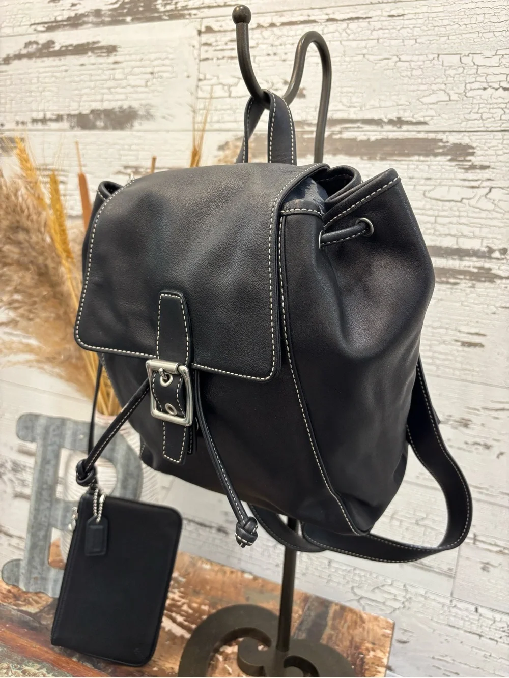 Coach Black Leather Drawstring Backpack with Silver Buckle